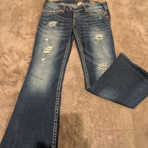 Women's Distressed Blue Jeans